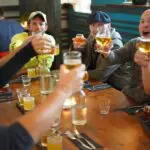 Group of men enjoying a beer