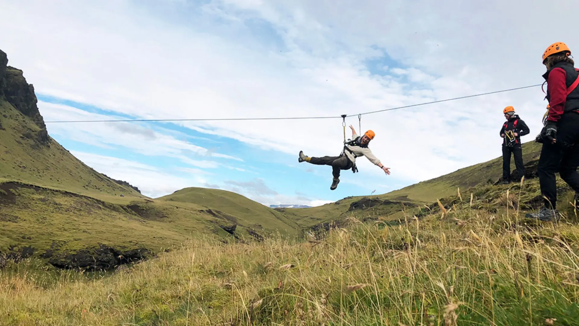 Tourists taking part in a zip-line tour in Iceland