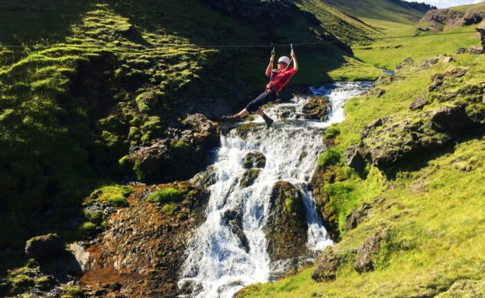 Zipline next to the waterfall in Vik in South Iceland