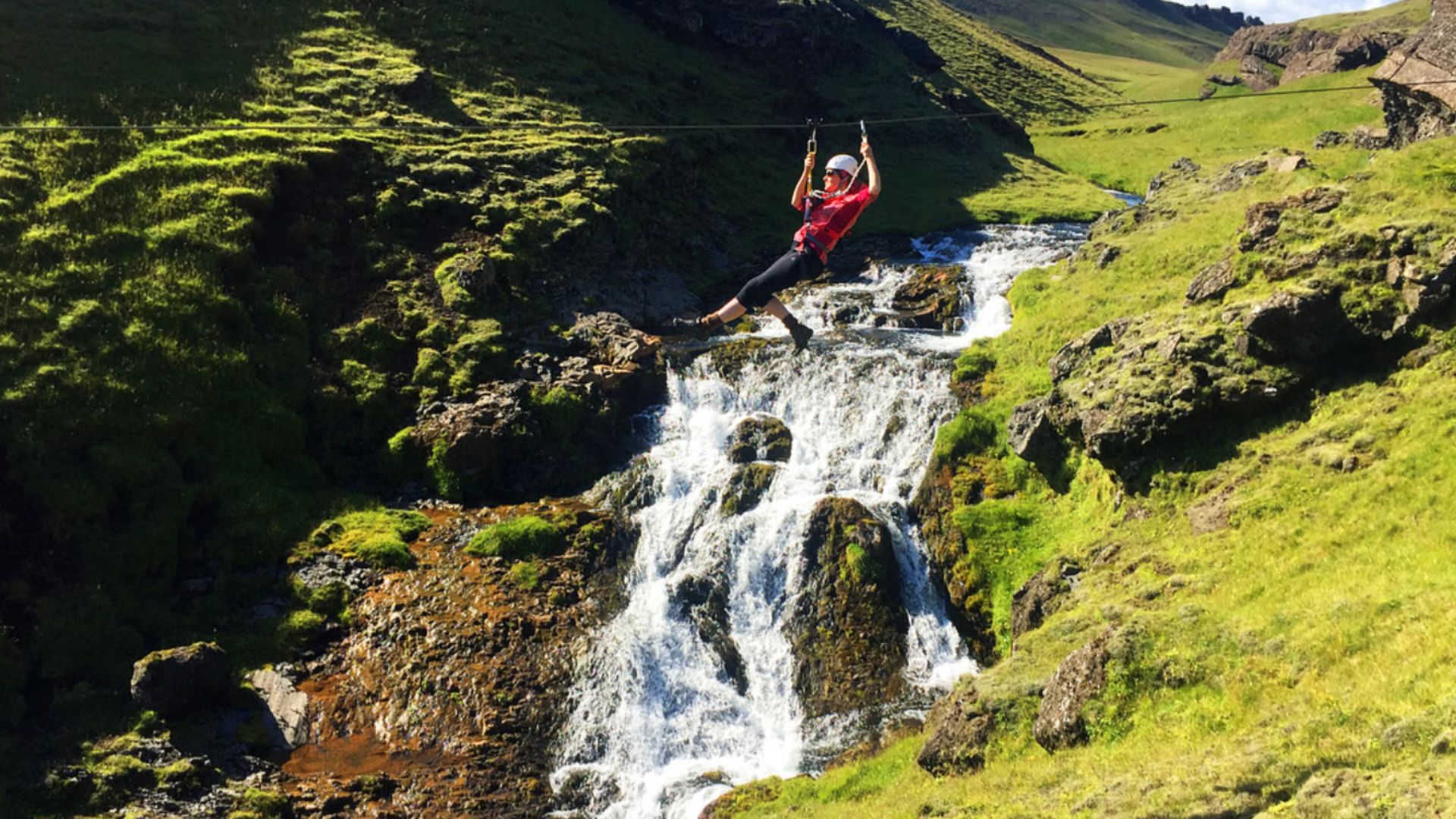 Zipline next to the waterfall in Vik in South Iceland
