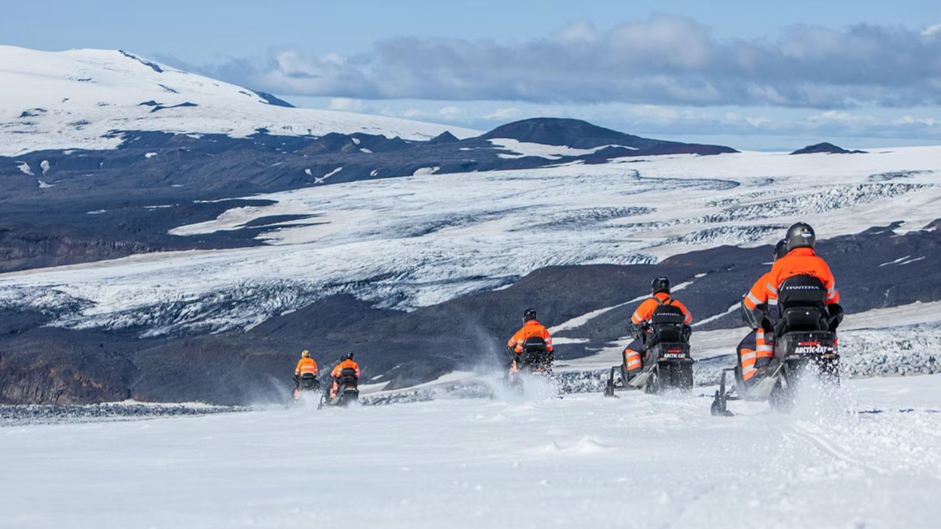 Tourists during the snowmobiling tour in Iceland