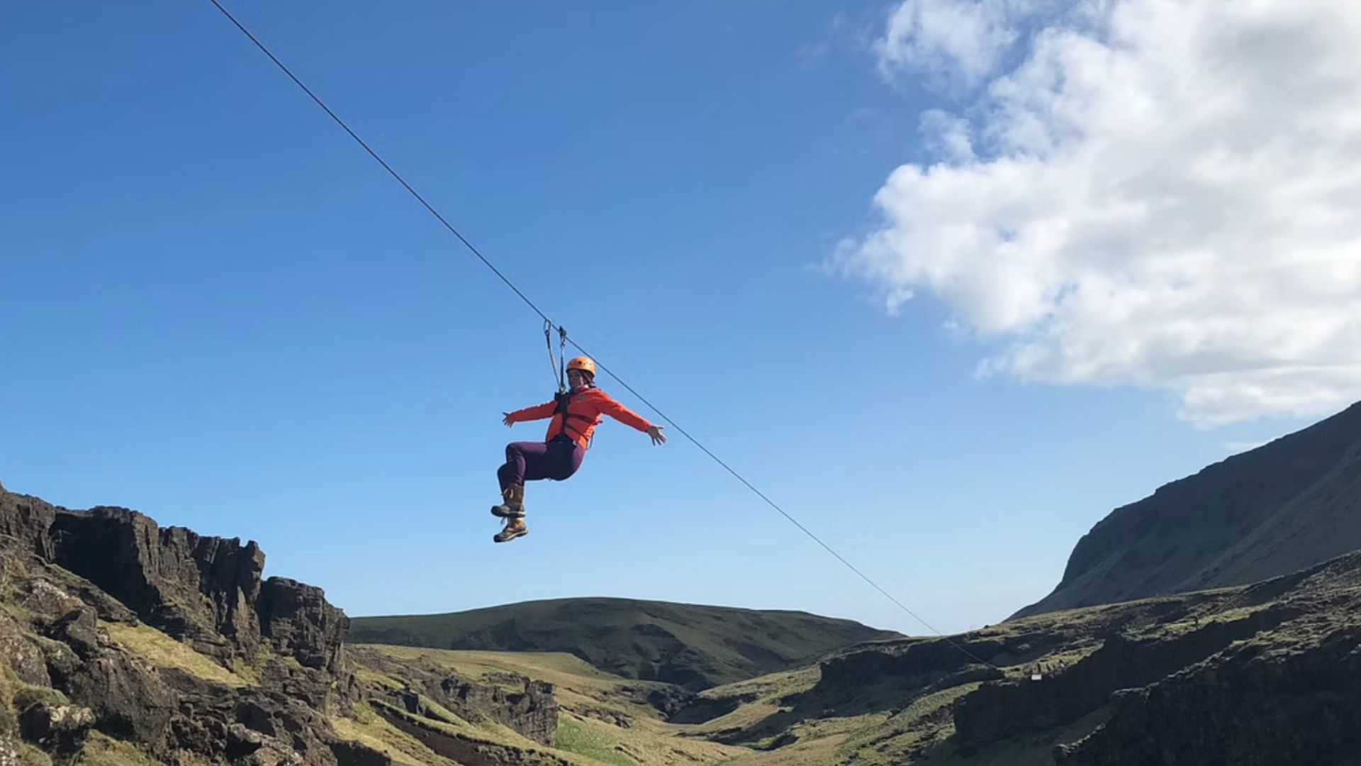 Tourist on a zipline in Vik in South Iceland
