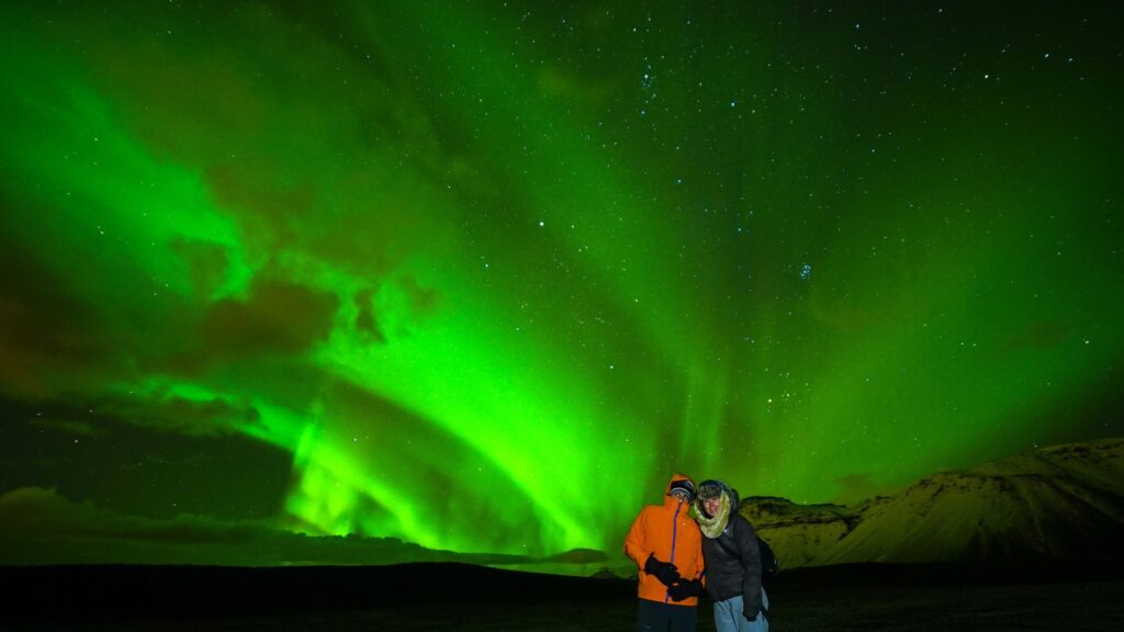 Tourists and the Northern Lights in Iceland