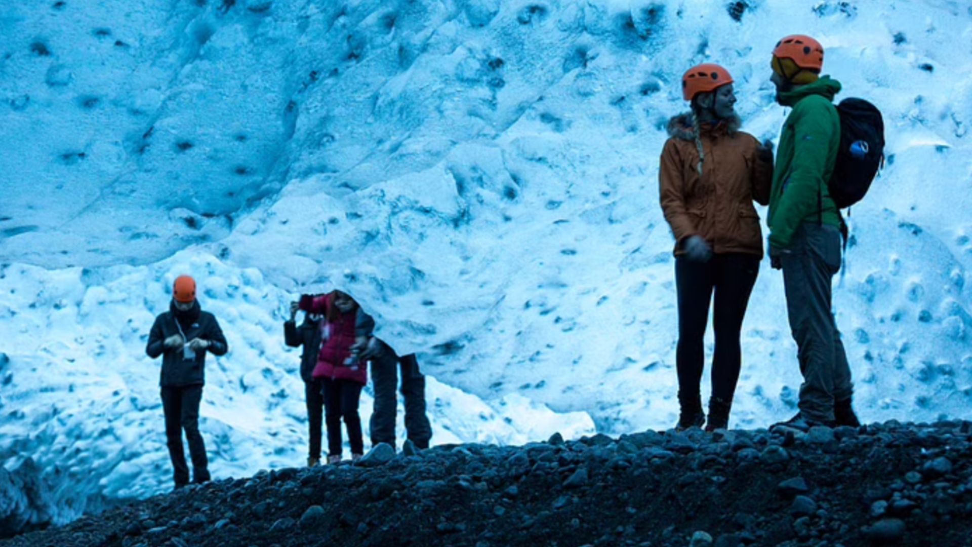 Tourists in the crystal ice cave in Iceland