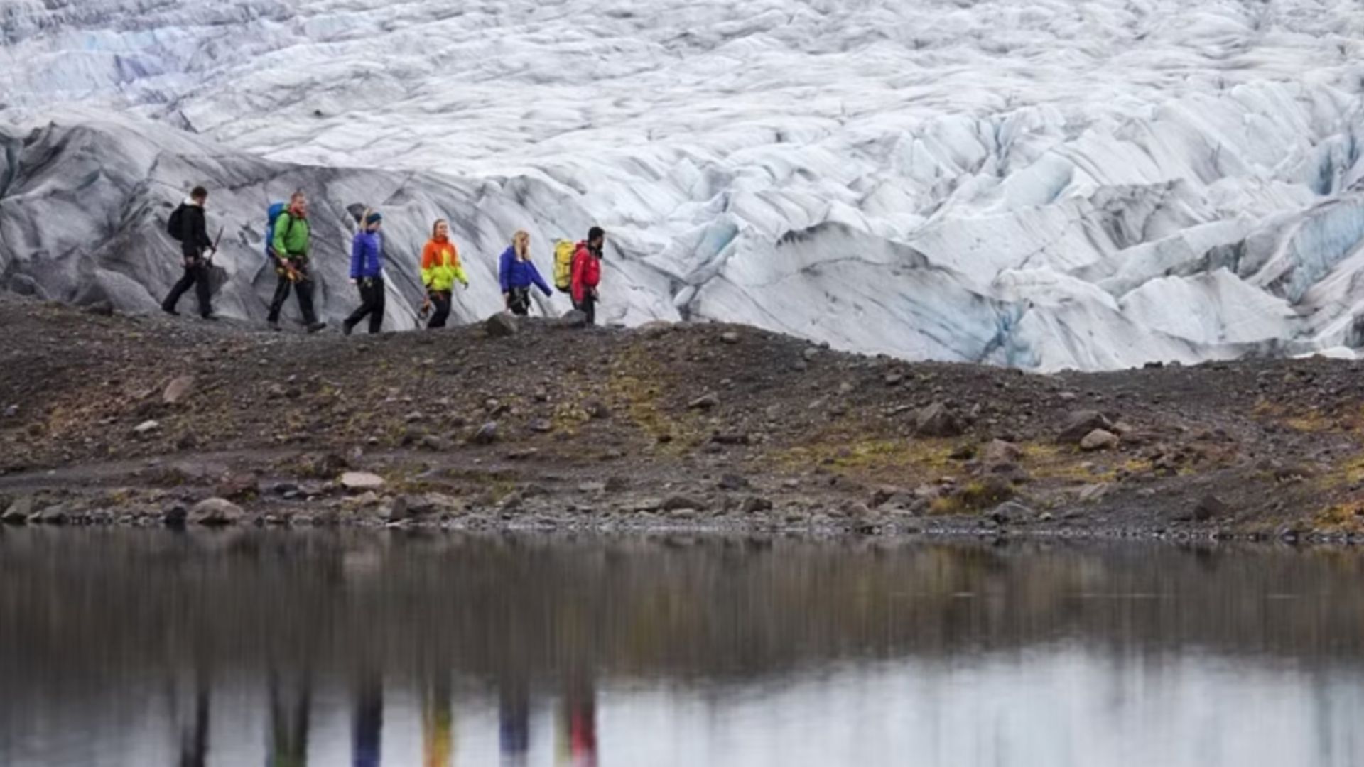 Tourists walking to the glacier in Iceland