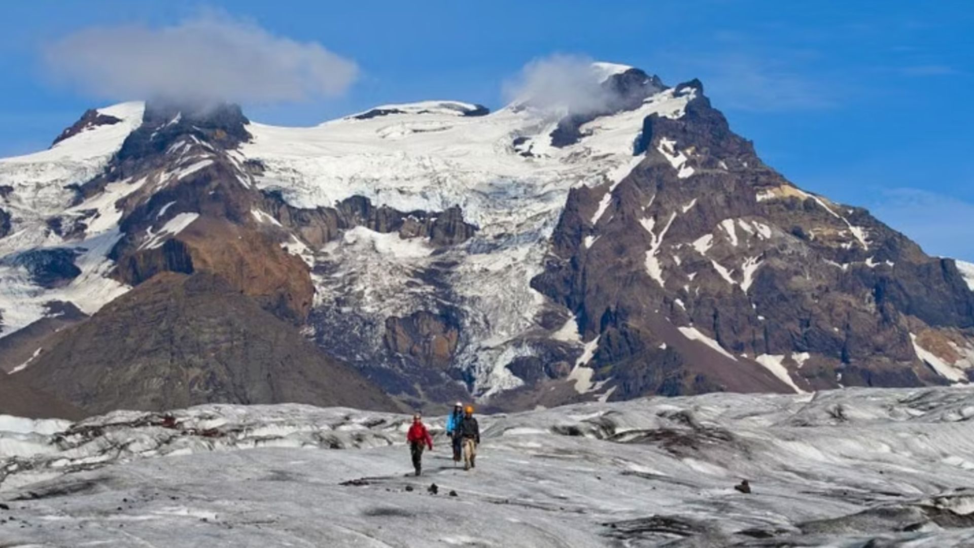 Tourists hiking on the glacier in Iceland