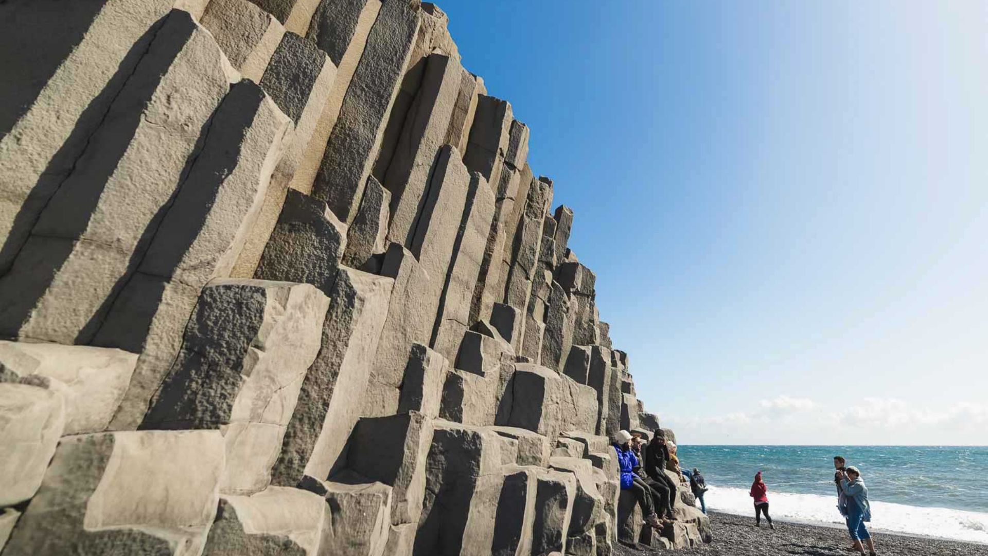Basalt columns black sand beach in Iceland
