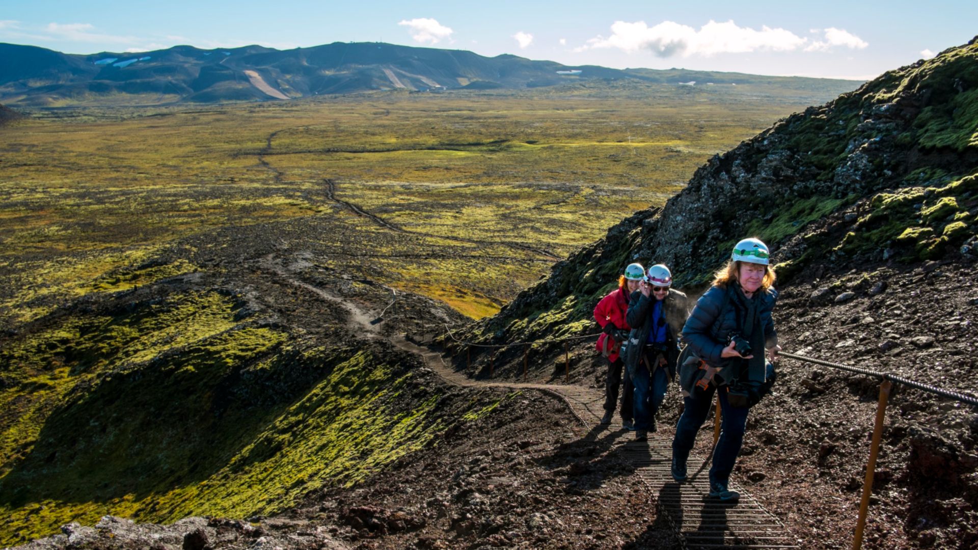 Tourists walking to the volcano in Iceland