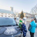 Travellers visiting a landmark in downtown Reykjavik