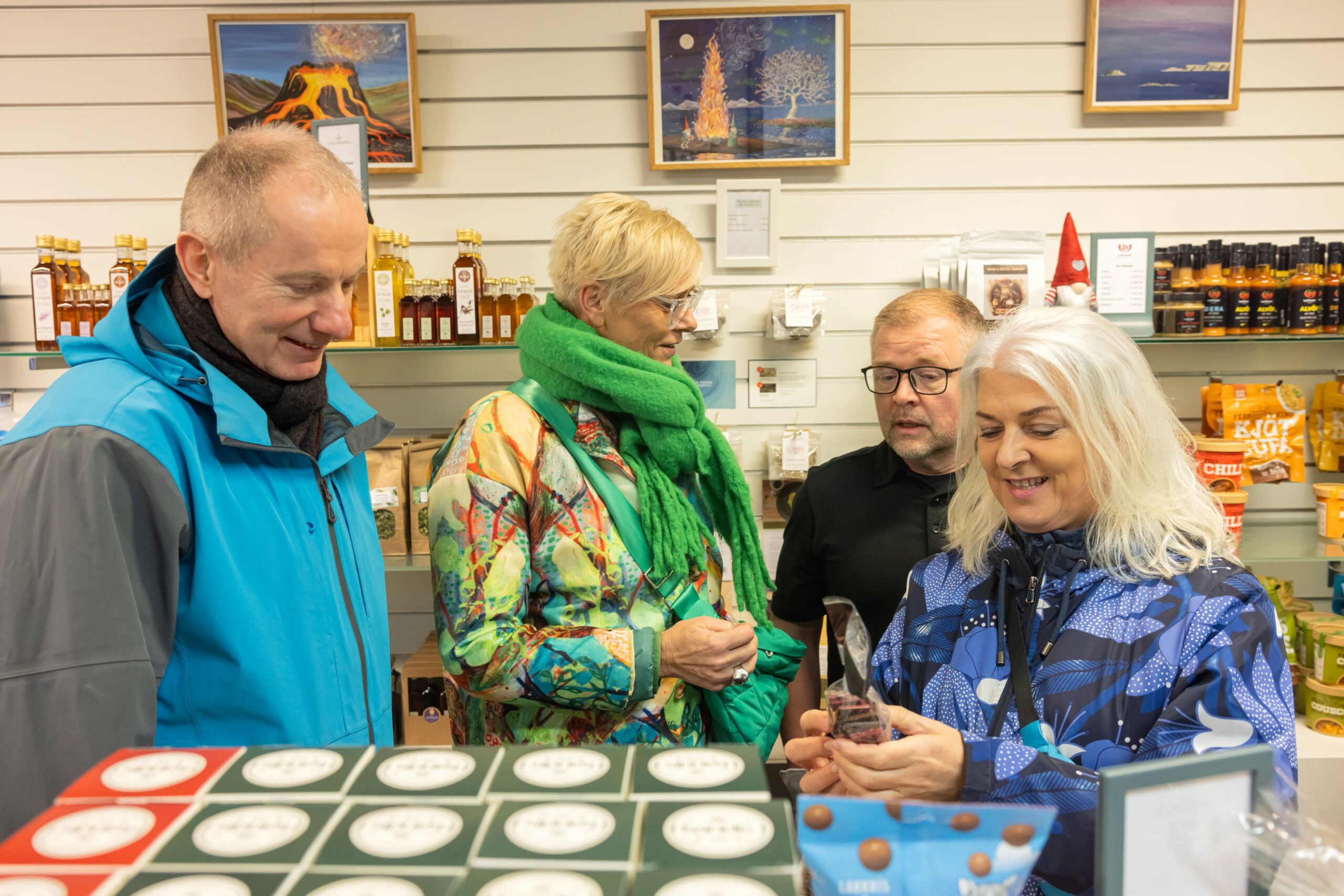 A tour Group browsing through a local speciality store in downtown Reykjavik.