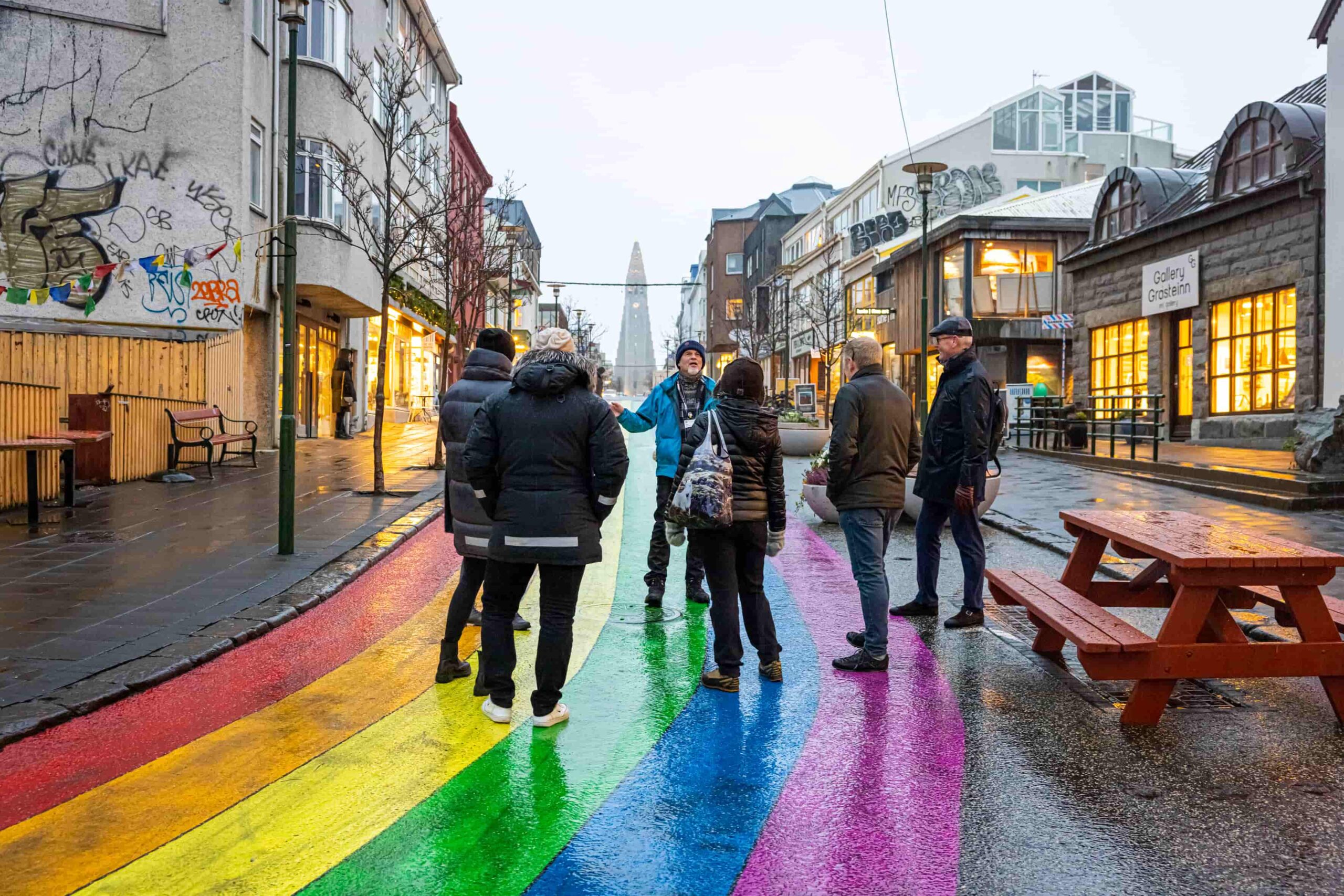 A group enjoying the Reykjavik Walking Tour by the Rainbow street