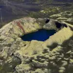Large crater with beautiful blue water inside