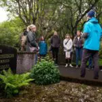 A guide talking to a tour group on the Reykjavik City & Folklore tour