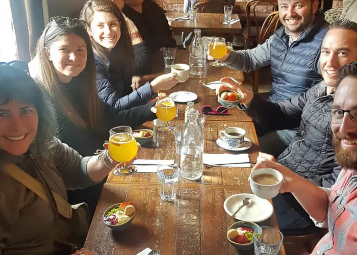 Group round a table enjoying a Private Vegetarian Tour in Iceland