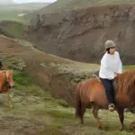 People riding on horseback on the Golden Circle Adventure & Horseback Riding trip