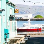 A picturesque shot of Reykjavik’s harbor, where fishing boats and modern vessels reflect the city’s deep connection to the sea