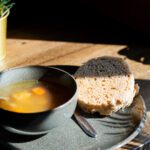 A hearty bowl of traditional Icelandic soup and bread, a delicious part of the Private Reykjavik Folklore & Food Walking Tour