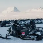 A parked snowmobile on the Golden Circle Adventure