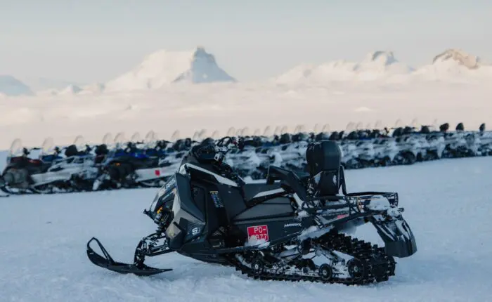 A parked snowmobile on the Golden Circle Adventure