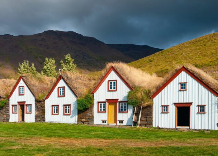Historic Laufás turf houses with grass roofs and wooden facades
