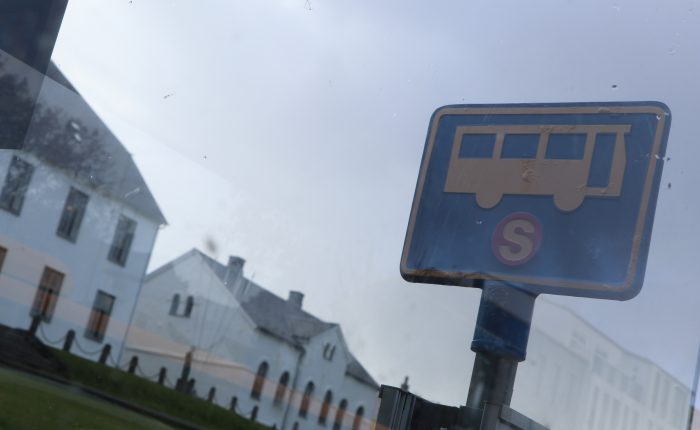 IMG_3969 A Strætó bus stop sign caught in the reflection.